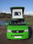 SX12381 Our green VW T5 campervan with popup roof up at Ogmore Castle.jpg